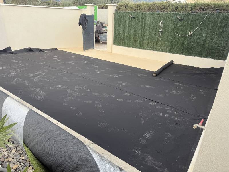 Pose de la bâche géotextile